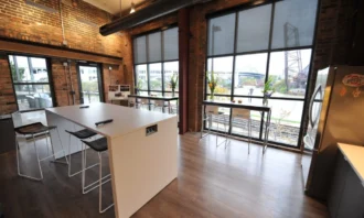 Hightop office seating overlooking the Cuyahoga River