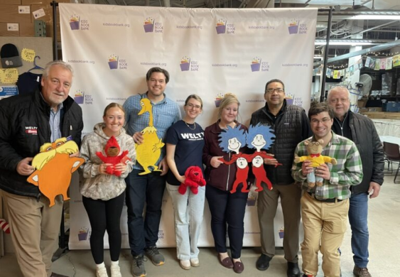 Welty team volunteering at the Kid's Book Bank