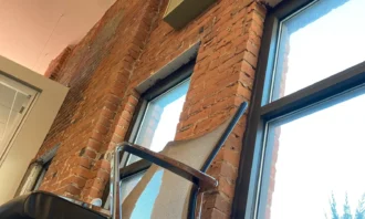 Chair with e4b sign above